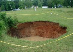 sink hole caused by Fort Payne, AL earthquake